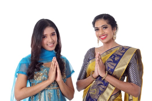 Two South east Asian Indian race ethnic origin woman wearing Indian dress costume sharee and salwar kameez multiracial community on white background photo