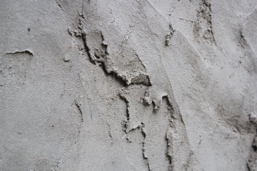 Uneven cement and sand wall texture background, grungy cement wall surface, rustic sand wall photo