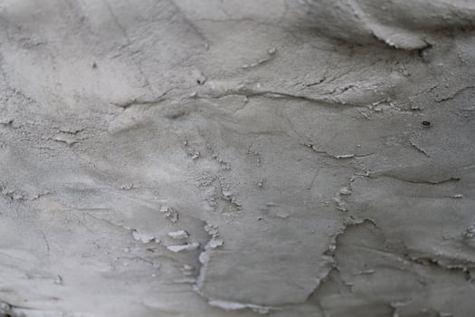 Uneven cement and sand wall texture background, grungy cement wall surface, rustic sand wall photo