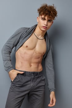 kinky guy posing inflated torso model isolated background photo