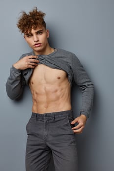 handsome guy posing inflated torso model Lifestyle unaltered photo