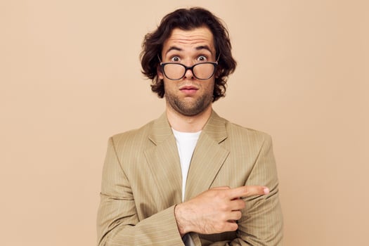 Attractive man with glasses emotions gesture hands posing Lifestyle unaltered photo