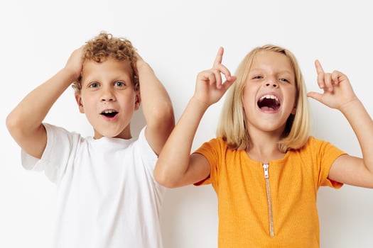 Cute preschool kids casual clothes posing emotions studio isolated background unaltered photo