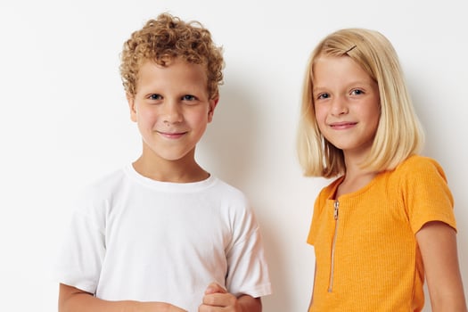 Small children casual clothes posing emotions studio isolated background unaltered photo