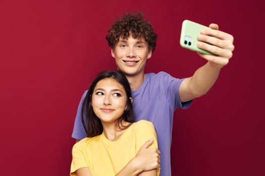 young man and girl modern style emotions fun phone Youth style photo