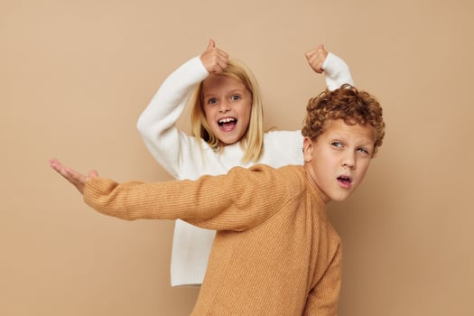 Little boy and girl hug entertainment posing friendship childhood unaltered photo