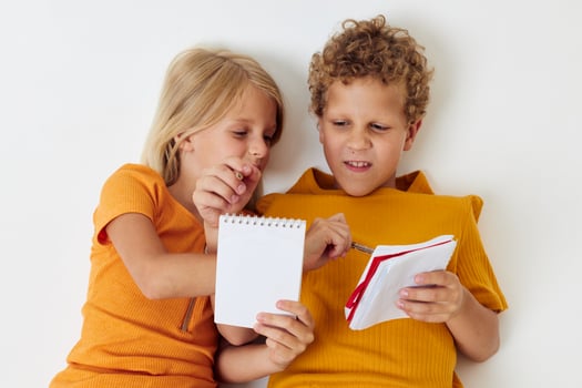 two joyful children childhood entertainment drawing childhood lifestyle unaltered photo