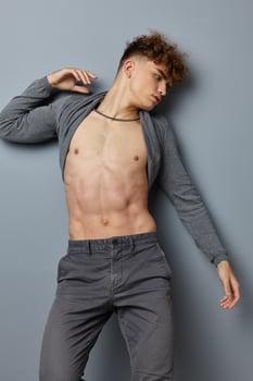 stylish guy posing inflated torso model isolated background photo
