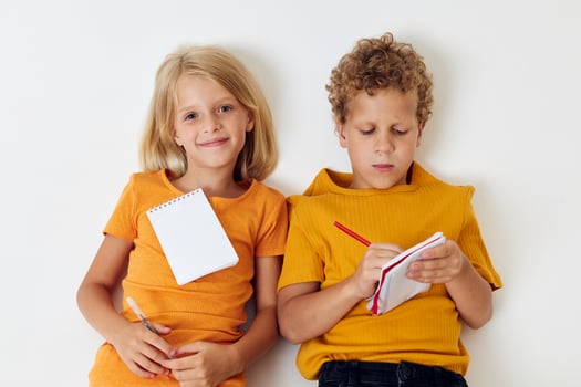 picture of positive boy and girl childhood entertainment drawing childhood lifestyle unaltered photo
