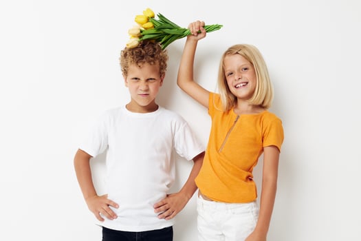 Small children with a bouquet of flowers gift birthday holiday childhood lifestyle unaltered photo