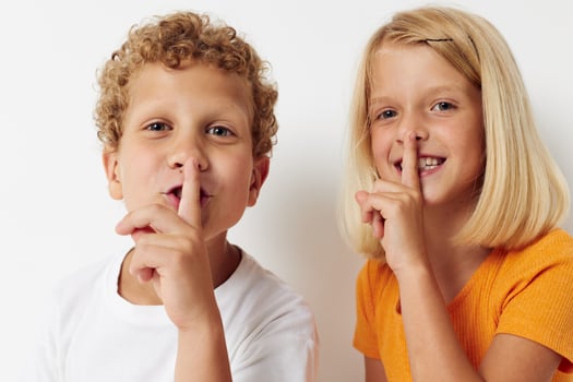 Small children entertainment emotions children studio light background photo