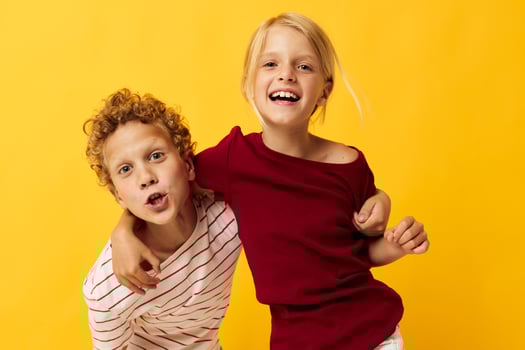 Cute stylish kids casual wear games fun together isolated background photo