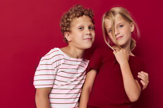 Cute stylish kids fun childhood entertainment red background photo