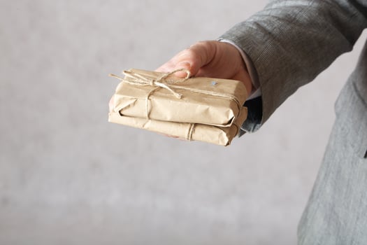 A man and a present. Closeup photo