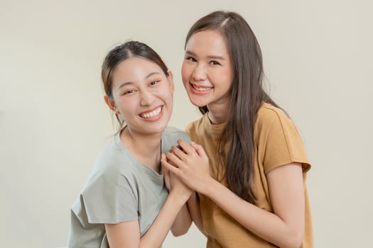 LGBT group. Female bisexualities couple holding hands showing love. Asian young couple hug each other happily, lover in love, bisexualities, homosexuality, liberty, expression, happy life, style photo