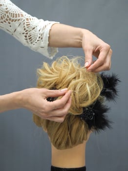 Training hair styling on a mannequin. photo