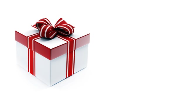 Gift box tied with a red ribbon on a white background, copy space. Stylish product packaging, presentation. Festive design concept. photo