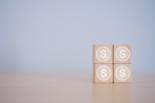 Financial concept or business growth dollar icon on wooden cube. photo