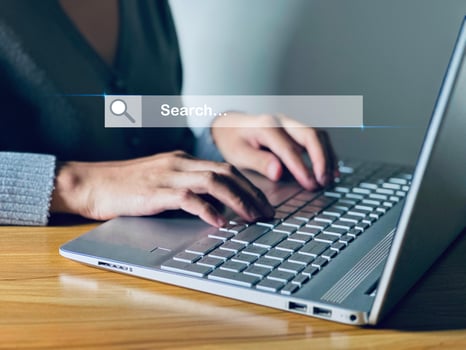 Business woman using laptop to search internet surfing information network concept. photo
