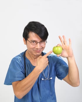 Young Asian male female doctor wearing apron uniform tunic apron hold photo