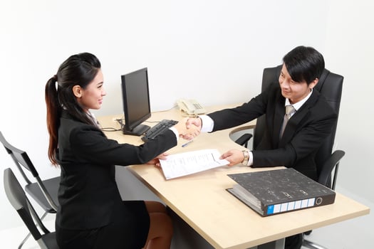 Young Asian man woman wearing business office suit chair table computer white background photo
