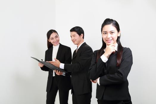 Young Asian man woman wearing business office suit stand white background photo