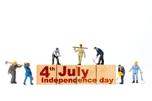Miniature people, Group of people celebrating the Fourth of July , Independence Day, United States photo