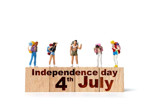 Miniature people, Group of people celebrating the Fourth of July , Independence Day, United States photo