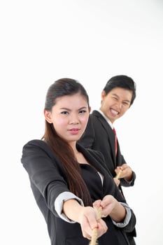 South East Asian young Chinese man woman wearing formal business office ware on white background pulling rope tug of war photo