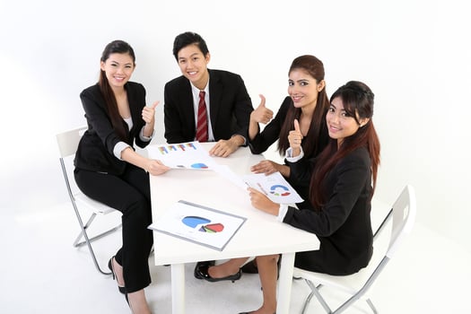 South East Asian young Malay Chinese Indian man woman wearing formal business office ware on white background sit at meeting table talk disuses study file project gruff thumbs up photo
