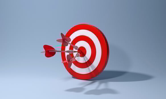 Red dart with arrow hitting target on blue background. Business aiming at the target concept. photo