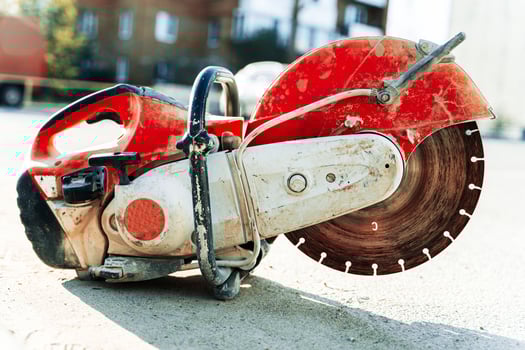 a gasoline cutting machine with a disc for cutting concrete photo