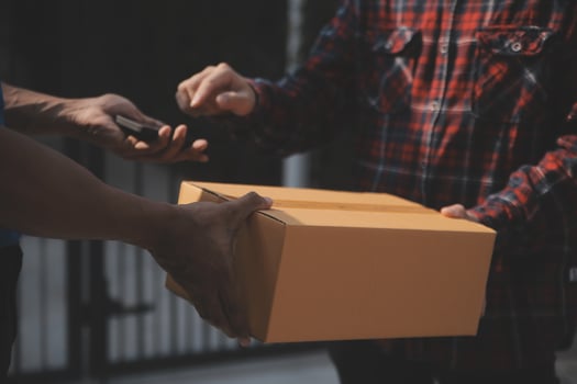 Business woman start up small business entrepreneur SME success .freelance woman working at home with Online Parcel delivery. SME and packaging deliveryconcept photo