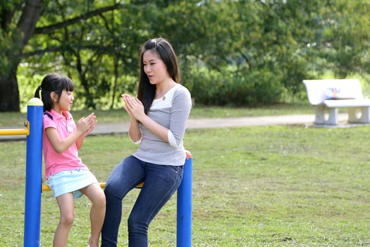 South East Asian young Chinese mother daughter parent child play relax activity outdoor park smile love photo