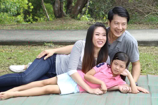 South East Asian young father mother daughter son parent boy girl child activity outdoors park photo