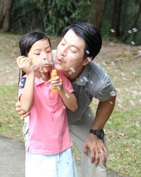 South East Asian young father mother daughter son parent boy girl child activity photo