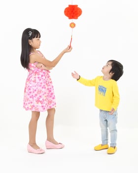 South East Asian young father mother daughter son parent boy girl child activity indoor photo