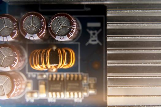 Background of various electronic components on printed circuit board photo