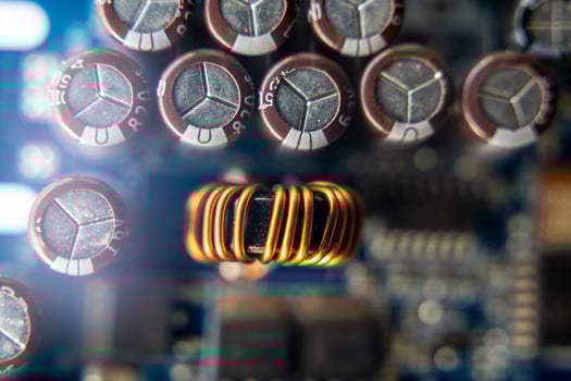 Background of various electronic components on printed circuit board photo