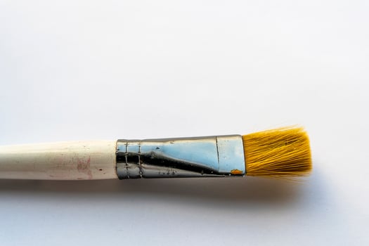 a brush for drawing on a white background photo