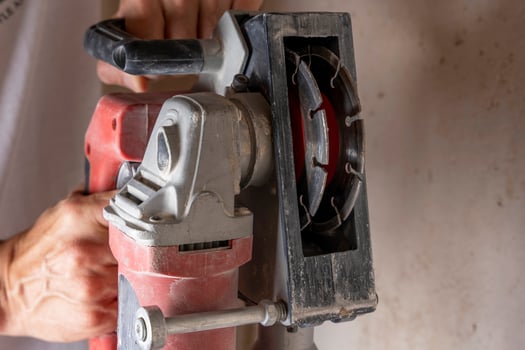 professional construction power tool for cutting grooves in concrete photo