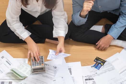 Top view financial owe asian young couple love sitting suffer, stressed and confused by calculate expense from invoice or bill, no money to pay, mortgage or loan. Debt, bankrupt or bankruptcy people. photo