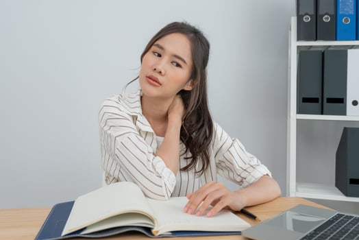 office syndromes, woman massaging neck pain due to work and using a computer, digital composite of a focused spine of neck pain and shoulder pain symptoms , injuries, health care, medical, myositis photo