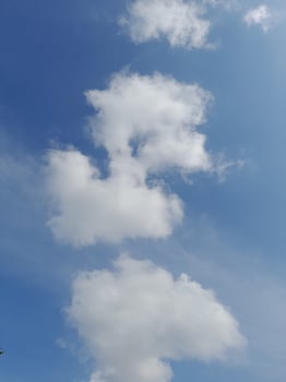 The white clouds on the blue sky are perfect for the background.  Skyscape on Lombok Island, Indonesia photo