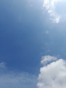 The white clouds on the blue sky are perfect for the background.  Skyscape on Lombok Island, Indonesia photo