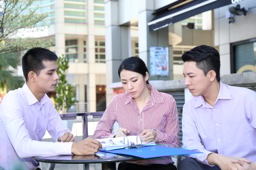 Young south east Asian middle eastern man woman business colleague outdoor stand pose photo