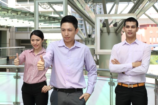 Young south east Asian middle eastern man woman business colleague outdoor stand pose photo