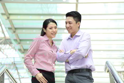 Young south east Asian middle eastern man woman business colleague outdoor stand pose photo