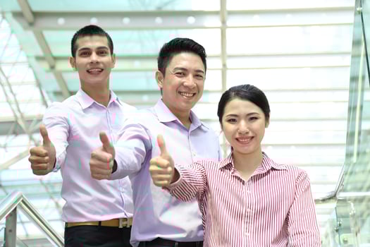 Young south east Asian middle eastern man woman business colleague outdoor stand pose photo