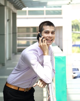 Young south east Asian middle eastern man woman business colleague outdoor stand pose photo